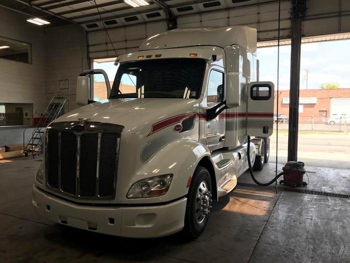 large semi truck getting serviced